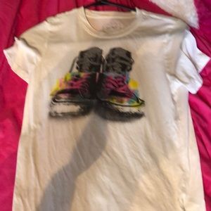 White shirt with shoes on it